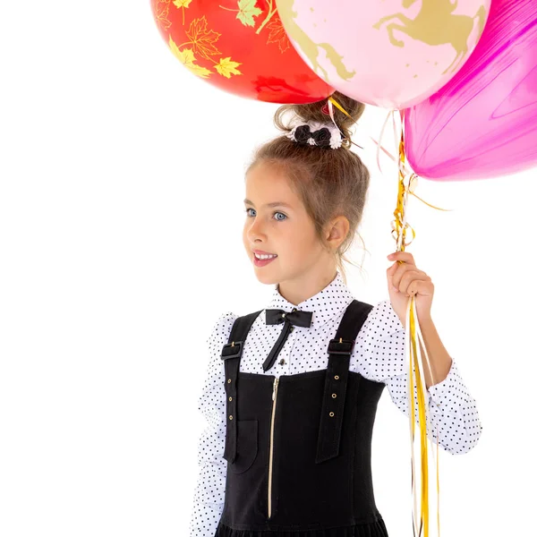 Petite fille avec des ballons d'hélium . — Photo