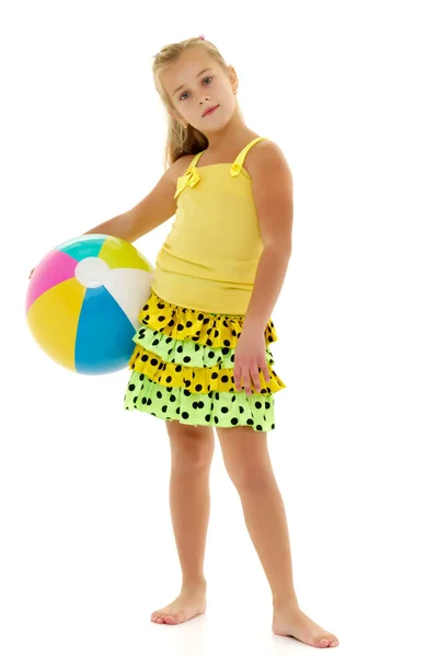 Little girl is playing with a ball — Stock Photo, Image