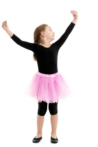 Ein fröhliches kleines Mädchen tanzt. — Stockfoto