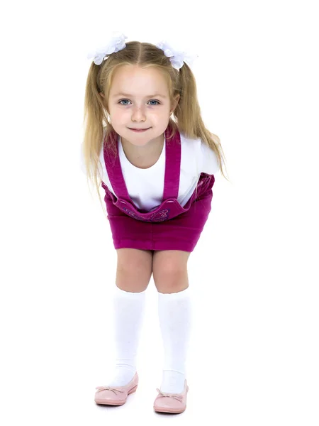 Menina posando em estúdio em um fundo branco . — Fotografia de Stock