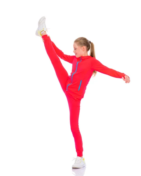 La gimnasta realiza un elemento acrobático . —  Fotos de Stock