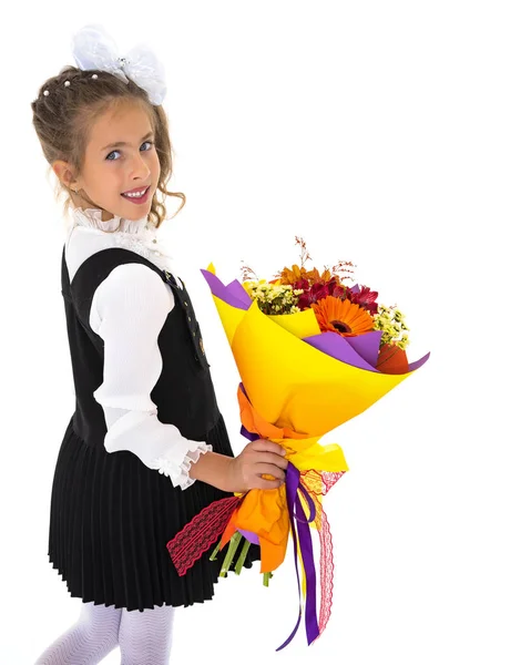 Menina com um buquê de flores — Fotografia de Stock