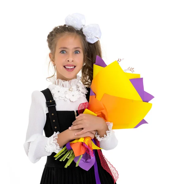 Menina com um buquê de flores — Fotografia de Stock