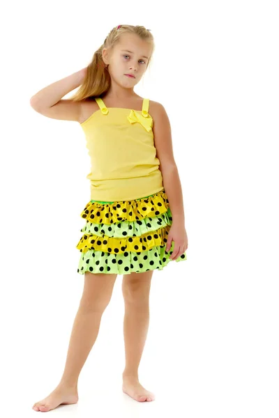 A little girl fixes her hair. — Stock Photo, Image