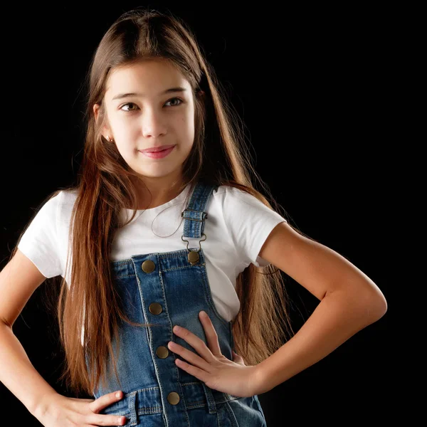 Little girl on a black background — Stock Photo, Image