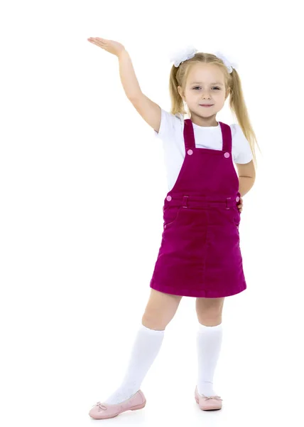 Niña posando en el estudio sobre un fondo blanco. — Foto de Stock