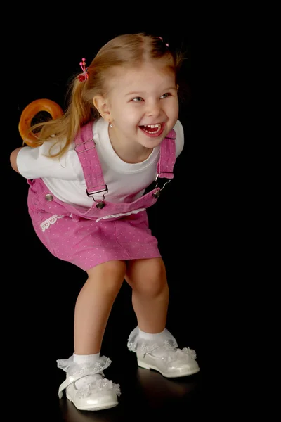 Menina em um fundo preto — Fotografia de Stock