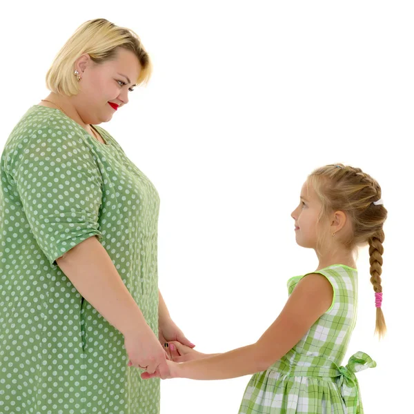 Mom and daughter hold hands. — Stock Photo, Image