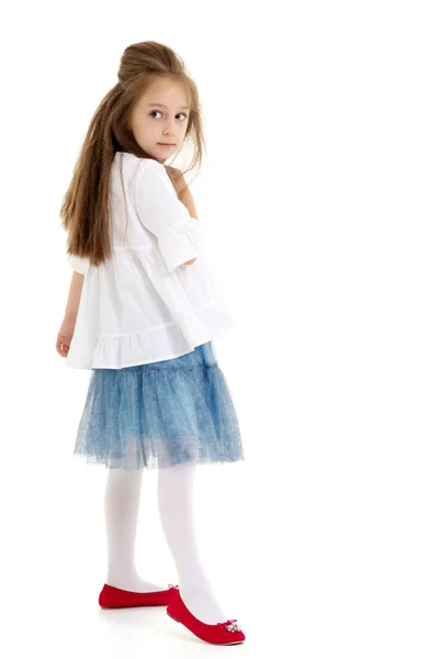 Little girl ballerina performs dance. — Stock Photo, Image