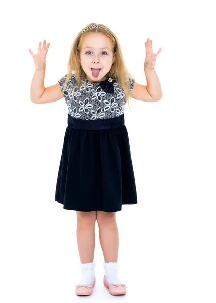 Little girl shows tongue. — Stock Photo, Image