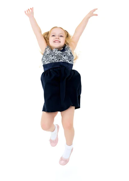 Mała dziewczynka skacze. — Zdjęcie stockowe