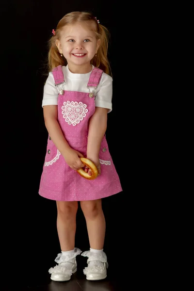 Little girl on a black background — Stock Photo, Image