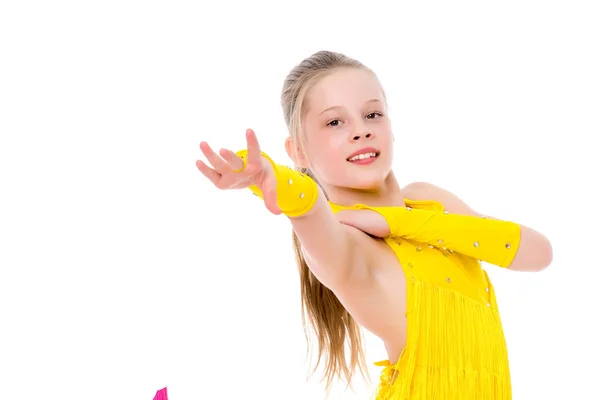 Una bambina allegra sta ballando . — Foto Stock