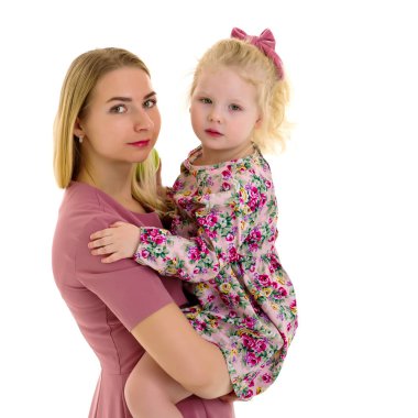 Anne ve küçük kızı stüdyo portre beyaz bir arka plan üzerinde.
