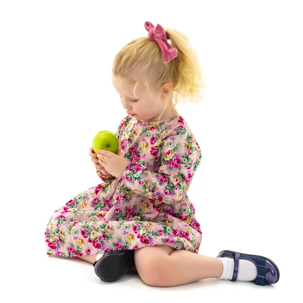 Little girl with apple — Stock Photo, Image