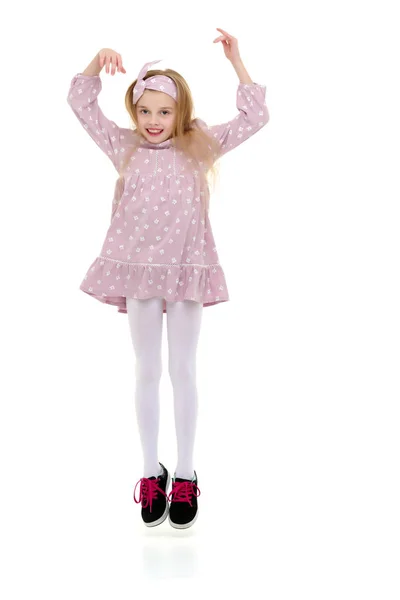 The little girl is jumping fun. — Stock Photo, Image