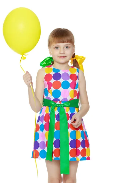 Little girl with a balloon. — Stock Photo, Image