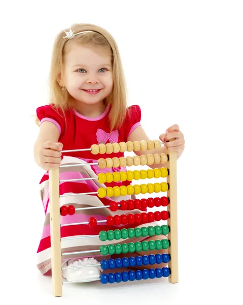 The girl counts on abacus — Stock Photo, Image