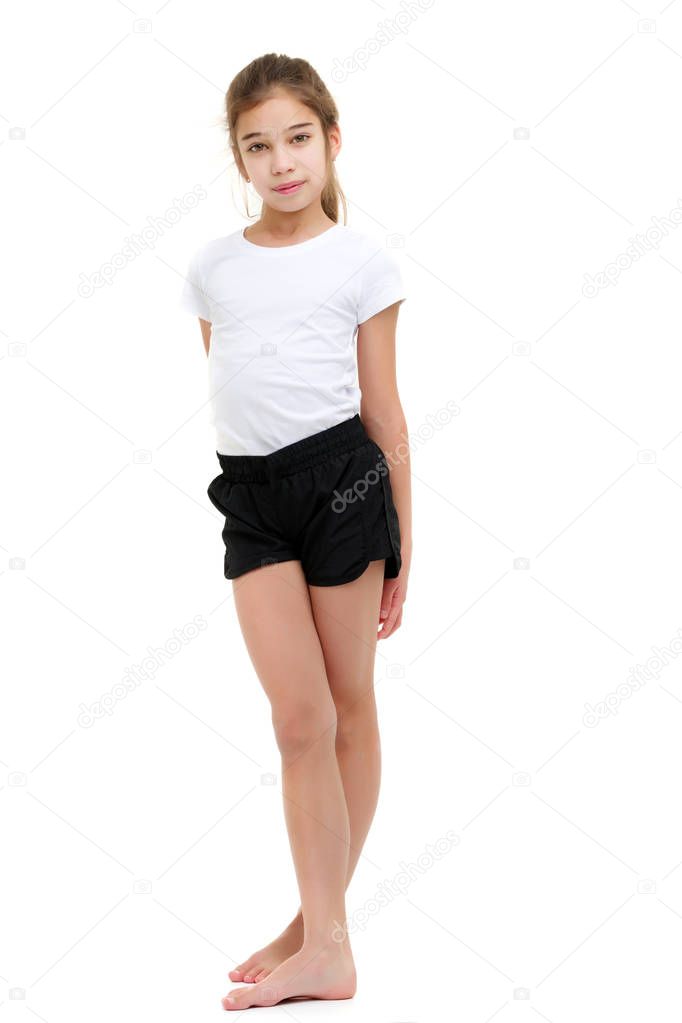 Little girl in a pure white t-shirt for advertising and shorts.