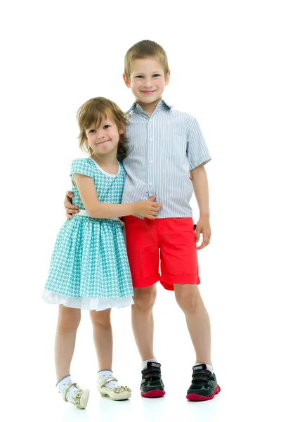 Brother and sister, boy and girl posing in the studio. Friendshi — Stock Photo, Image