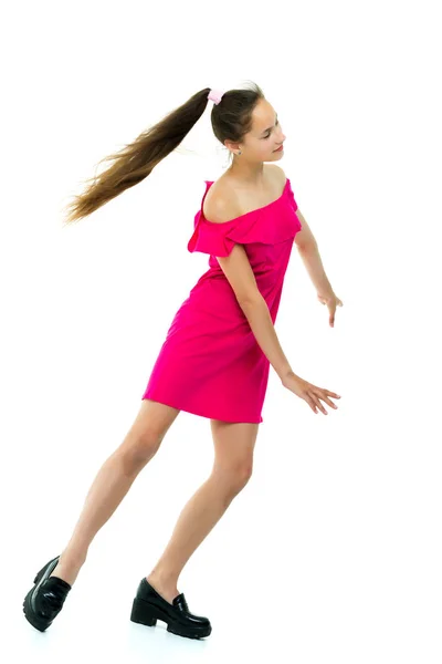 Una niña alegre está bailando . — Foto de Stock