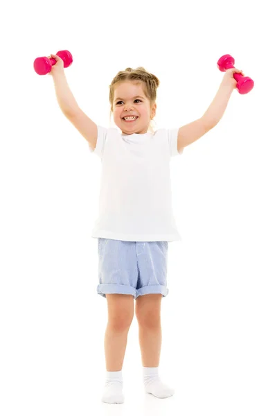 Menina fazendo exercícios com halteres. — Fotografia de Stock