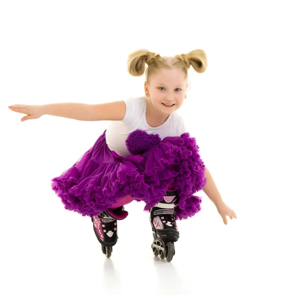 Little girl on roller skates. — Stock Photo, Image