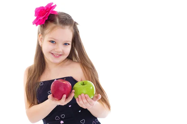 Little girl with apple.Isolated on white background. — Stock Photo, Image