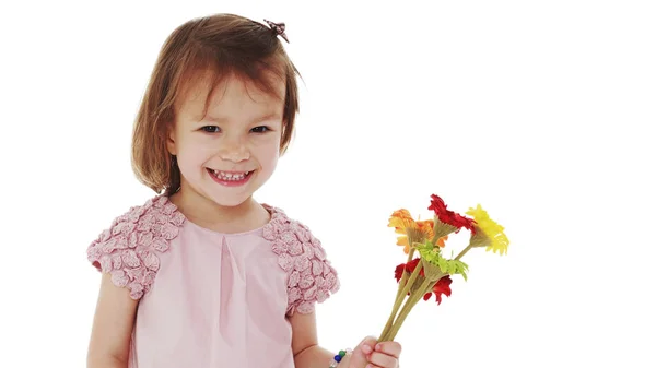 Encantadora niña riendo felizmente en el estudio —  Fotos de Stock