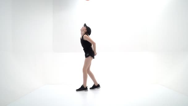 A girl gymnast performs exercises with a mace. — Stock Video