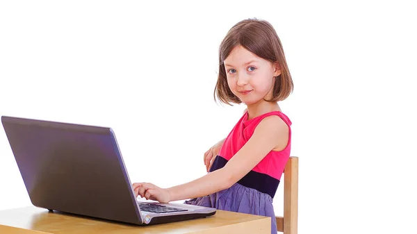 Girl with silver color laptop on the ground isolated on white — Stock Photo, Image