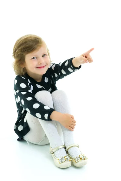 Little girl points with a finger — Stock Photo, Image