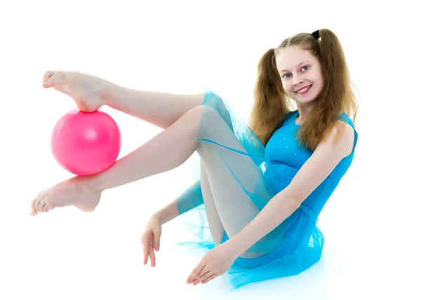 Girl gymnast performs exercises with the ball. — Stock Photo, Image