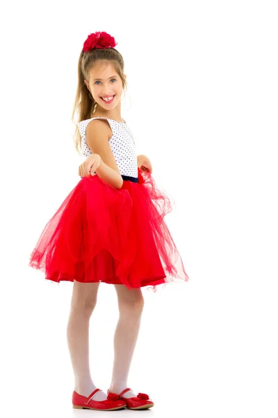 एक सुंदर पोशाक में छोटी लड़की. एक खुश बचपन की अवधारणा — स्टॉक फ़ोटो, इमेज
