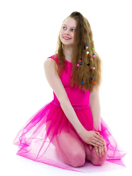 Ginasta menina bonita em seu cabelo que está espalhado com multi — Fotografia de Stock