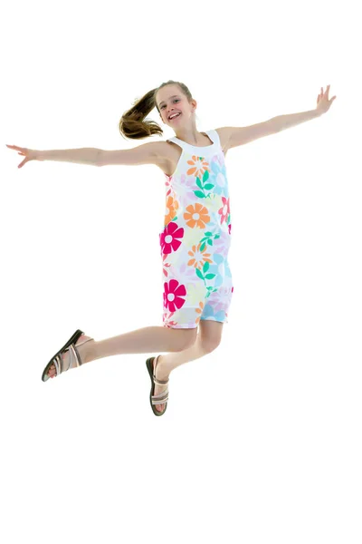 Little girl is jumping.The concept of a happy childhood, outdoor — Stock Photo, Image