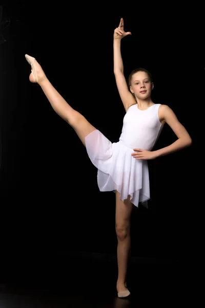 Full length portrait of a charming gymnast girl in elegant dress. — Stock Photo, Image