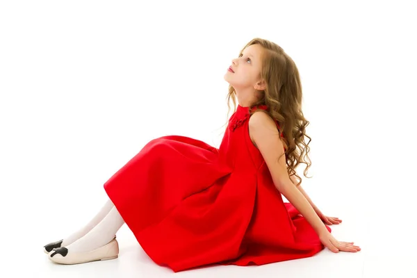 Cute Preteen Girl Sitting on the Floor with Her Knees Up — Stock Photo, Image