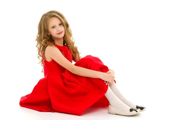 Cute Preteen Girl Sitting on the Floor with Her Knees Up — Stock Photo, Image