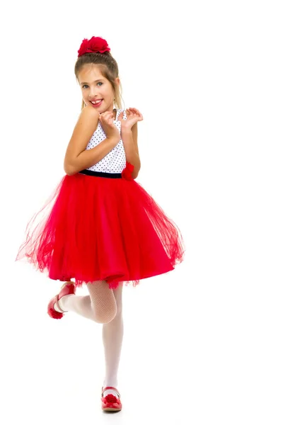 Κοριτσάκι σε ένα κομψό φόρεμα. Η έννοια της ευτυχισμένης παιδικής ηλικίας — Φωτογραφία Αρχείου
