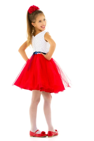 Κοριτσάκι σε ένα κομψό φόρεμα. Η έννοια της ευτυχισμένης παιδικής ηλικίας — Φωτογραφία Αρχείου
