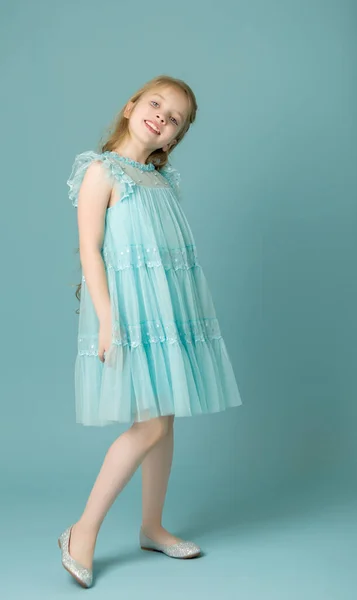 Elegant girl in a dress. Youth fashion concept, happy child. — Stock Photo, Image