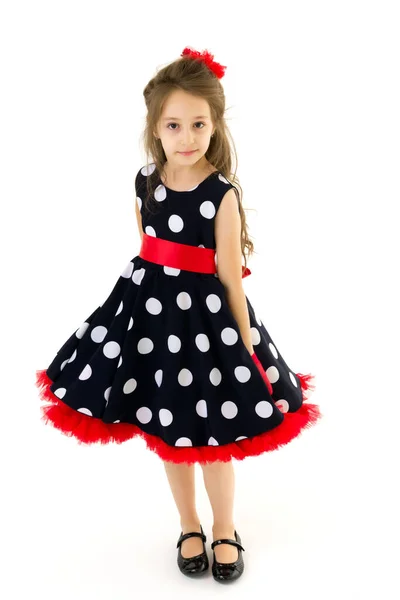 Full length portrait of a beautiful polka dot girl. — Stock Photo, Image