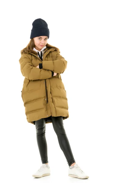 Beautiful little girl in a fashionable coat. — Stock Photo, Image