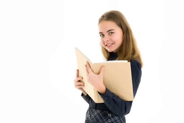 Dívka školačka s knihou.Izolované na bílém pozadí. — Stock fotografie
