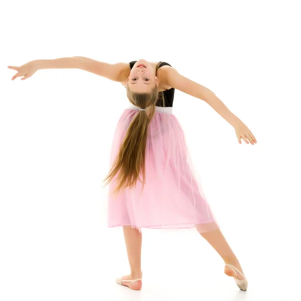 Gracieuse fille gymnaste effectuer des exercices de gymnastique rythmique. — Photo