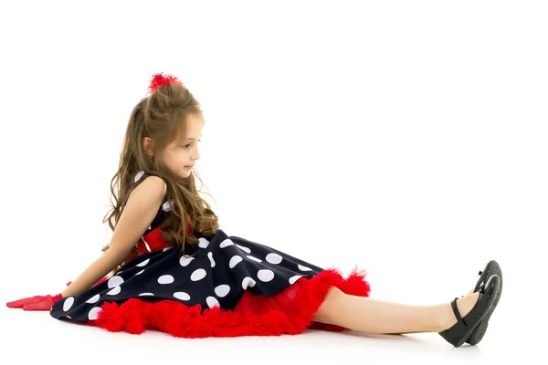 A cheerful little girl is dancing.The concept of a school of dance. — Stock Photo, Image