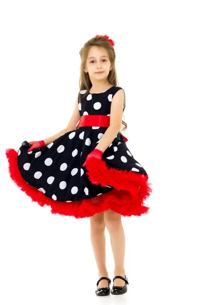 Coquettish Girl Posing in Polka Dot Dress, Red Gloves and Black — Stock Photo, Image