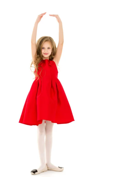 Fröhliches Mädchen mit erhobenen Armen auf weißem Hintergrund. — Stockfoto
