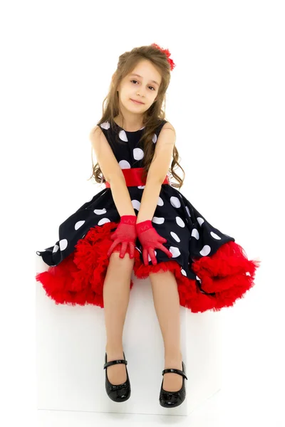 Girl in Polka Dot Dress, Red Gloves and Bow Standing Looking Awa. — Stock Photo, Image